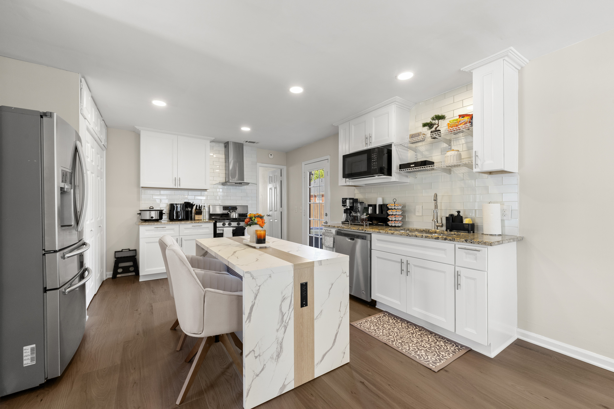 Bright kitchen with an island set up for everyday cooking