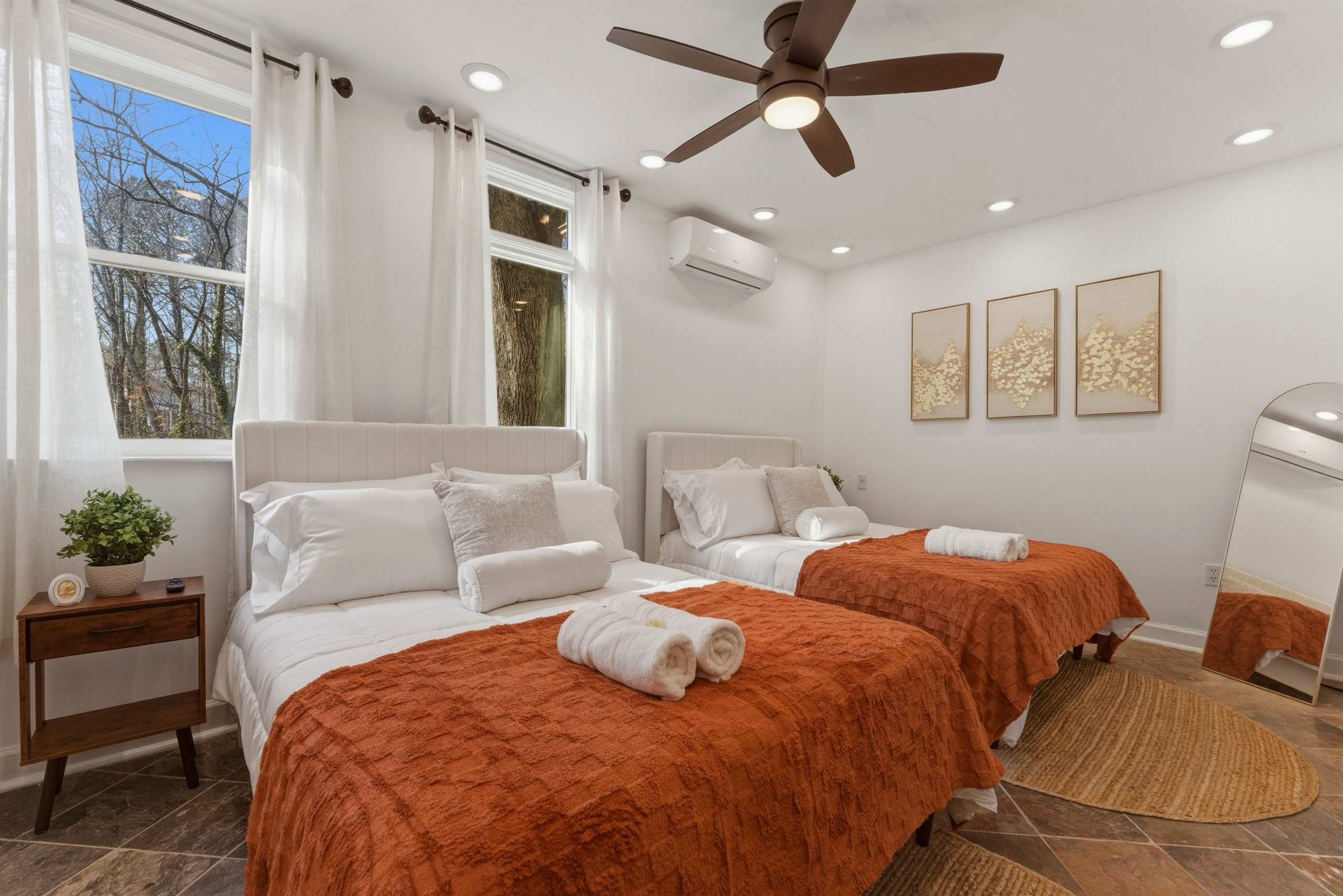 Double-bed room prepared for team housing or paired stays