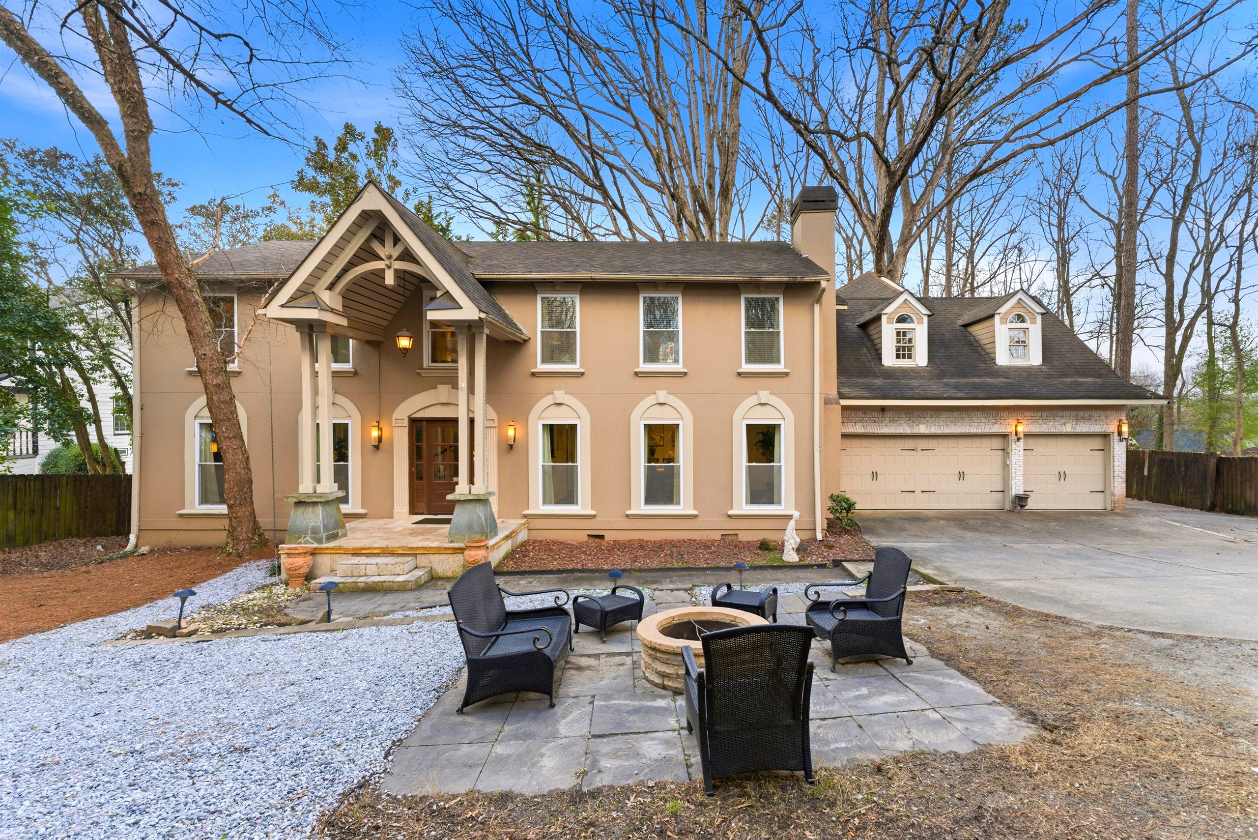 Exterior view of a larger furnished home prepared for team-based stays